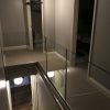 our Solus system on landing area glass balustrade