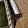 aluminox handrail end cap on frameless glass balustrade on decking